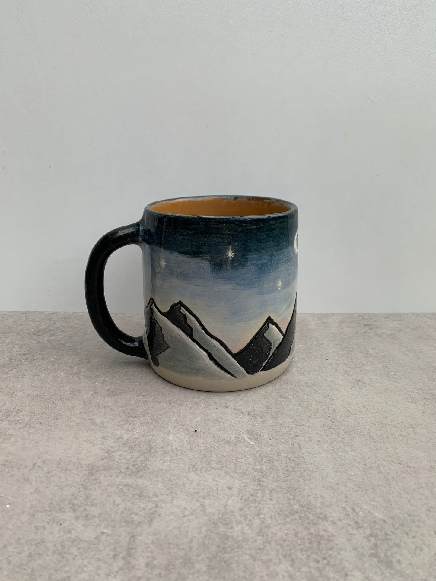 Mountains in the night mug
