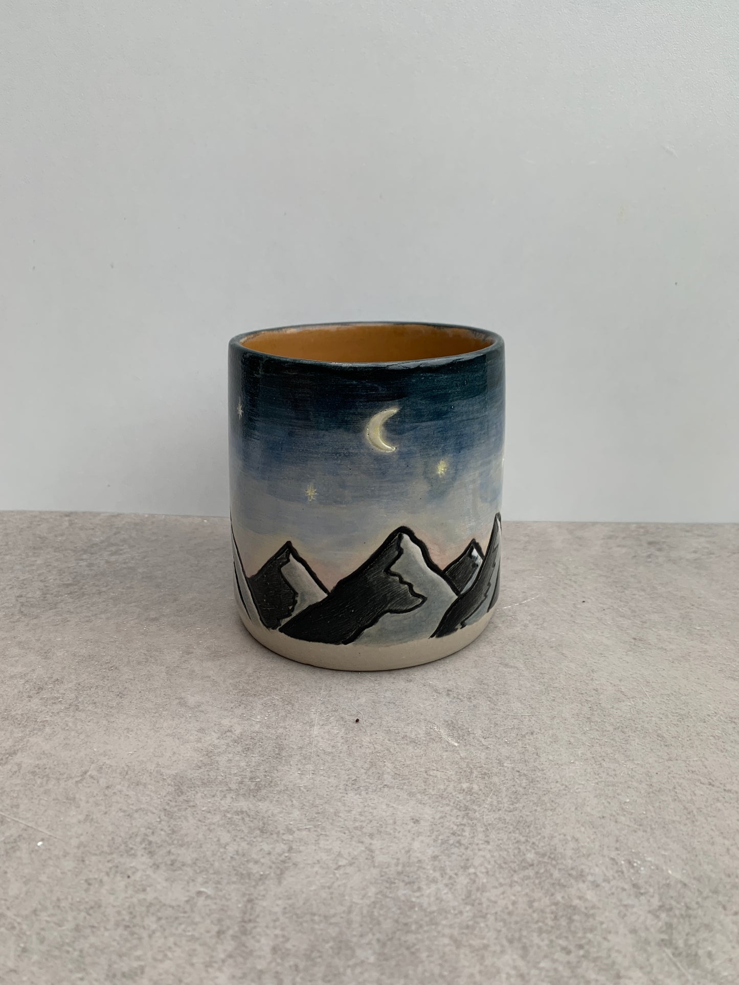Mountains in the night mug