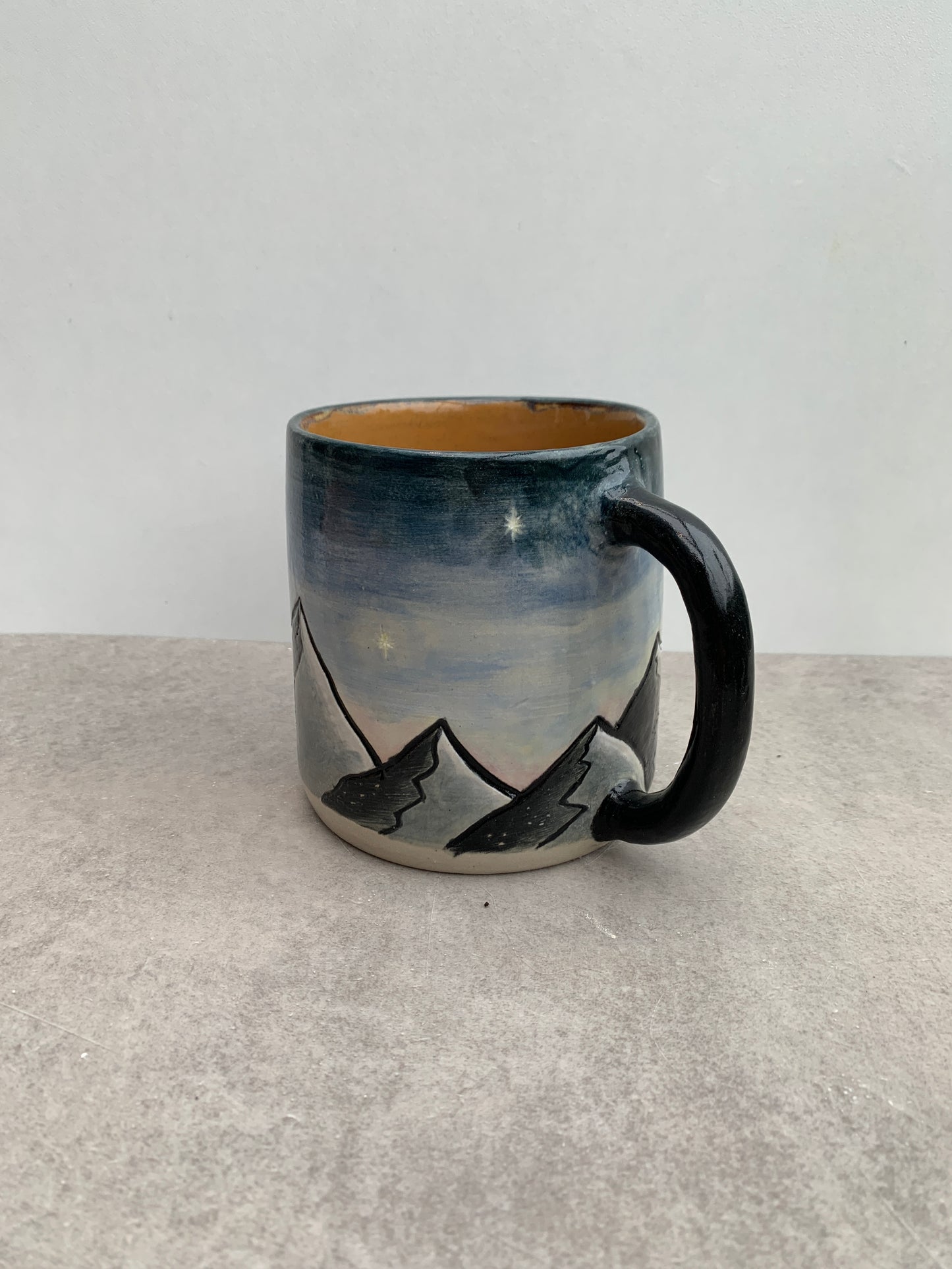 Mountains in the night mug