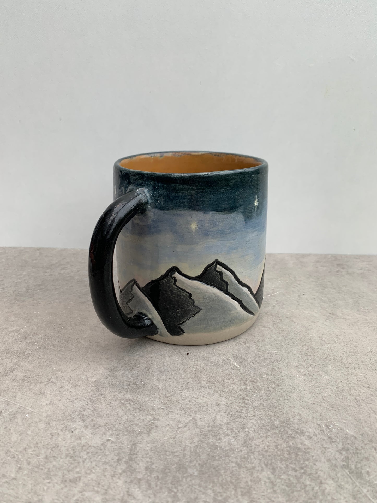 Mountains in the night mug