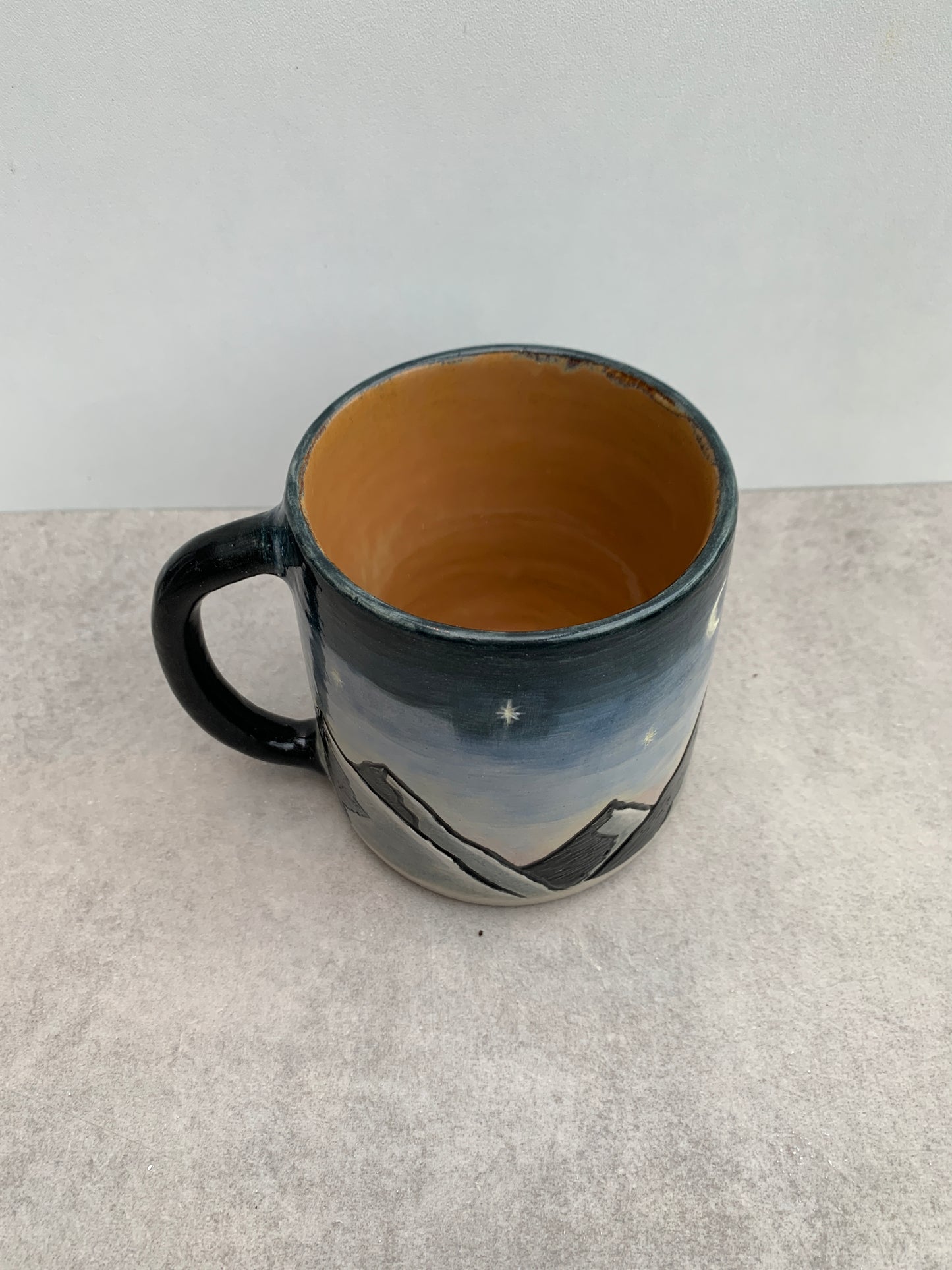 Mountains in the night mug