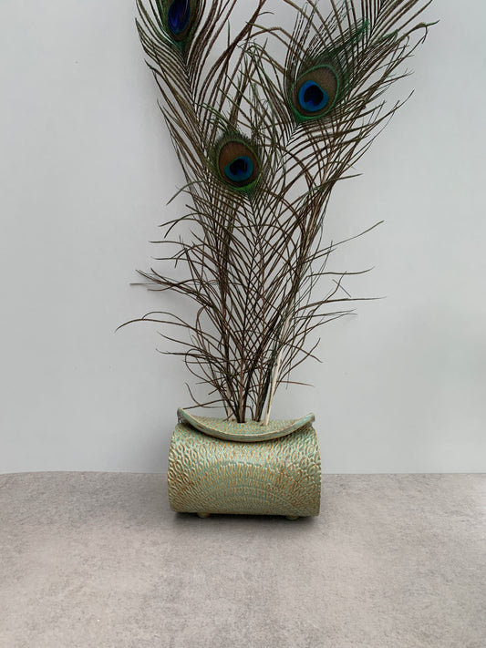 Feather holder